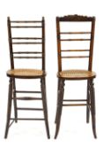 Two 19th century child's correction chairs with turned backs,