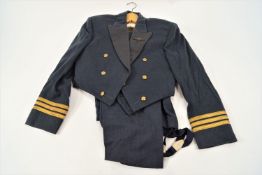 The RAF mess dress of Wing Commander D R Young together with photographs of him