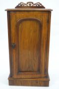 A 19th century mahogany pot cupboard of usual rectangular form with plain top with pierced cresting