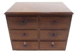 A 19th century mahogany small chest of six drawers with turned ebonised handles,