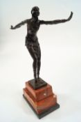 After P H Chiparus, bronze figure of a dancer on a stepped marble base, foundry mark, 49cm high,