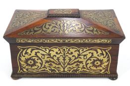 A Regency rosewood and brass inlaid tea caddy,