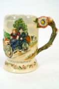 A Crown Devon musical mug, Daisy Bell, moulded with a couple riding a tandem bicycle,