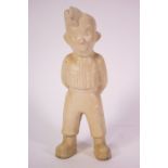 A Bovey Tracey pottery figure of Tommy,