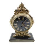 A French mantel clock, the 15cm dial with Roman numerals,