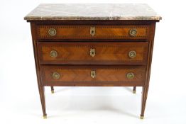 A 19th century French Kingwood chest of three drawers on square tapering legs with gilt metal feet