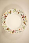 A Minton porcelain eight setting part dinner service,