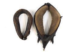 A leather horse collar and horse haines,