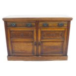A late 19th century mahogany sideboard with plain rectangular top over two drawers