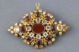 A 19th century yellow metal multi gem set brooch set with a selection of aquamarines, garnet,