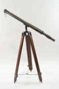 A brass cased field telescope, apparently un-marked, with pull off lens cover, 99cm high,