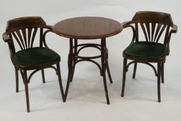 A bentwood table and three arm chairs, in the Art Deco style in hardwood,