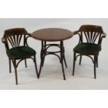 A bentwood table and three arm chairs, in the Art Deco style in hardwood,