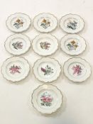 A porcelain Dresden service comprising ten plates printed and painted with flowers