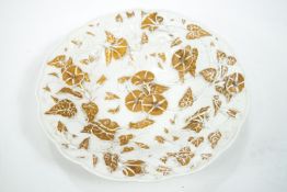 A 19th Century Meissen porcelain dish with raised gilt foliate floral work,