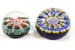 A Perthshire millefiore paperweight and three other paperweights
