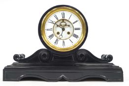 A Victorian black slate mantel clock, the white enamel dial with visible anchor escapement,