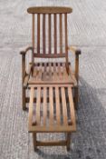 A Barlow Tyrie, teak and brass mounted garden recliner