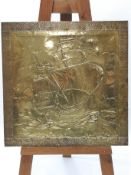 An Arts & Crafts brass wall panel, decorated galleon in sail, circa 1920,