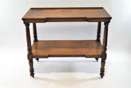 A19th century oak two tier buffet with inverted break front, 96cm high, 118cm wide,