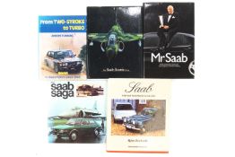 A Saab owner club badge and other Saab memorabilia