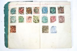 A Victorian stamp album containing World stamps,