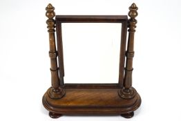 A rectangular gilt framed wall mirror with central bevelled mirror plate with a sectional mirrored