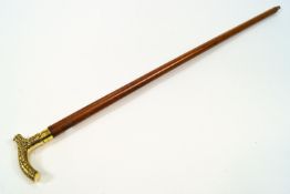 A malacca walking stick with cast brass handle,