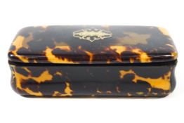 A 19th century tortoiseshell rectangular snuff box with pique inset panel to the cover,