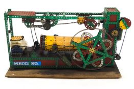 A large vintage Meccano motorised pumping model with numerous moving parts,