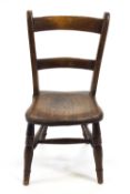 A childs19th century chair with rail back and turned legs linked by H stretchers