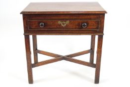 A George III mahogany low boy, with one frieze drawer, square legs linked by X stretchers,