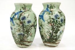 A pair of Chinese vases, of octagonal baluster form,