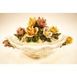 A Capodimonte shaped bowl, with flower encrusted cover,