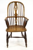 Two Windsor chairs, with bentwood rail and arms,