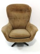 A Swedfurn for MFI swivel armchair with button back