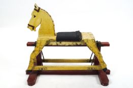 A mid 20th century provincial carved wood Rocking horse with painted finish