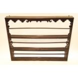 A late 19th century oak and pine plate rack,