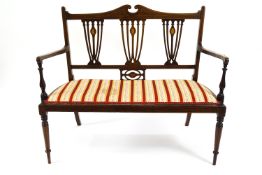 An Edwardian two seat sofa and a pair of bedroom chairs