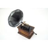 An oak cased Columbia Cylinder gramophone, patented May the 4th 1886,