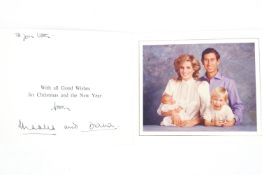 A Prince Charles and Diana signed 1984 Christmas card, containing a photograph