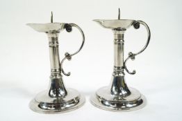 Two pewter pricket candlesticks by A E Williams, in the Tudor style,