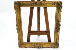 A Victorian gilt wood and plaster picture frame to fit painting size 17cm x 83cm