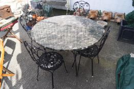 A marble topped round garden table on wrought iron base (base 91cm diameter,