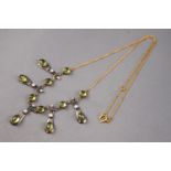 A yellow and white metal centrepiece necklace,