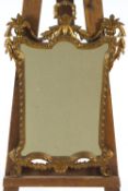 A wall mirror with gold painted moulded frame in 18th century style,