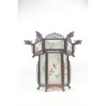 A Chinese carved hardwood and acid etched glass hexagonal pendant light shade with pierced cresting