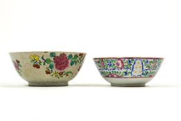 Two Chinese porcelain bowls, each painted in coloured enamels,