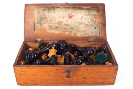 A carved hardwood weighted chess set, apparently un-marked,