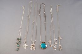 A collection of six silver necklaces of variable designs.